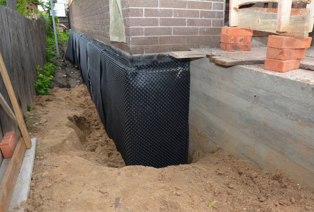 SJ Waterproofing Pros technician performing targeted Sump Pump Installation assessment in Manchester, WA